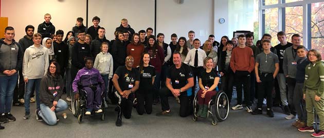 AQA Unlocking Potential participants pose for a photo at the Manchester office